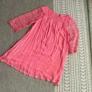 Peachy pink muslin and lace style dress